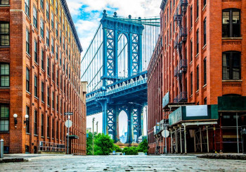 Fotobehang Manhattan Bridge tussen de Gebouwen