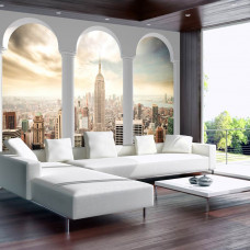 Een fotobehang met een 3D-uitzicht op New York bedrukt op vliesbehang, ideaal voor een woonkamer.