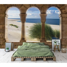 Een fotobehang met een 3D-uitzicht op een strandlandschap met pilaren, perfect voor een slaapkamer en woonkamer.