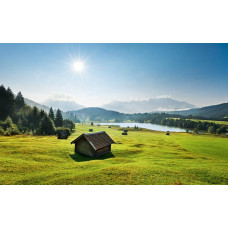 Bergweide Karwendel fotobehang, met een rustige ochtendzon over de weiden.