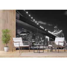 Een fotobehang van de Brooklyn Bridge bij nacht in New York voor de woonkamer.