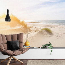 Een prachtig strand- en duinlandschap op fotobehang, ideaal voor een woonkamer.