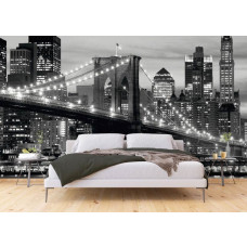 Een zwart-wit fotobehang van de iconische Brooklyn Bridge in New York stad in een slaapkamer.