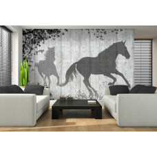 Een fotobehang met de schaduw van paarden tegen een betonnen muur in een huiskamer.