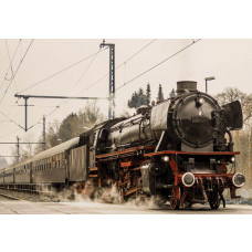 Fotobehang van een stoomlocomotief trein, robuust en klassiek.